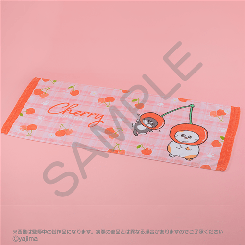 ねこに転生したおじさん　さくらんぼフェイスタオル